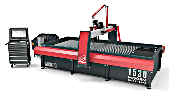 OMAX waterjet cutting machine with its control workstation